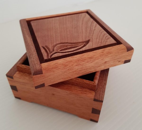 Secrets box. A little square, dovetailed box with a false floor for ...